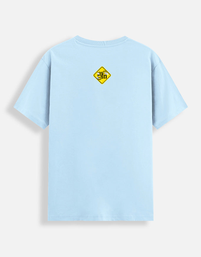 Light blue moonearth t-shirt with a yellow and black logo on the back against a white background