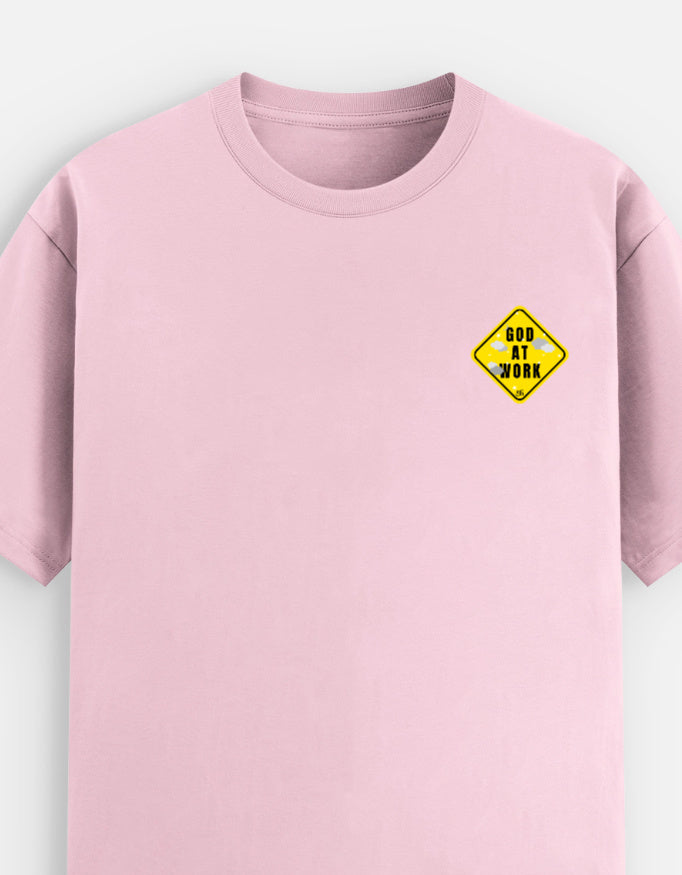 Baby pink moonearth t-shirt with a yellow and black graphic on a light gray background