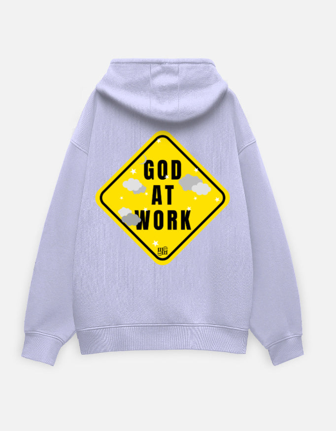 Light purple moonearth hoodie with a yellow and black 'God at Work' sign on the back against a light gray background