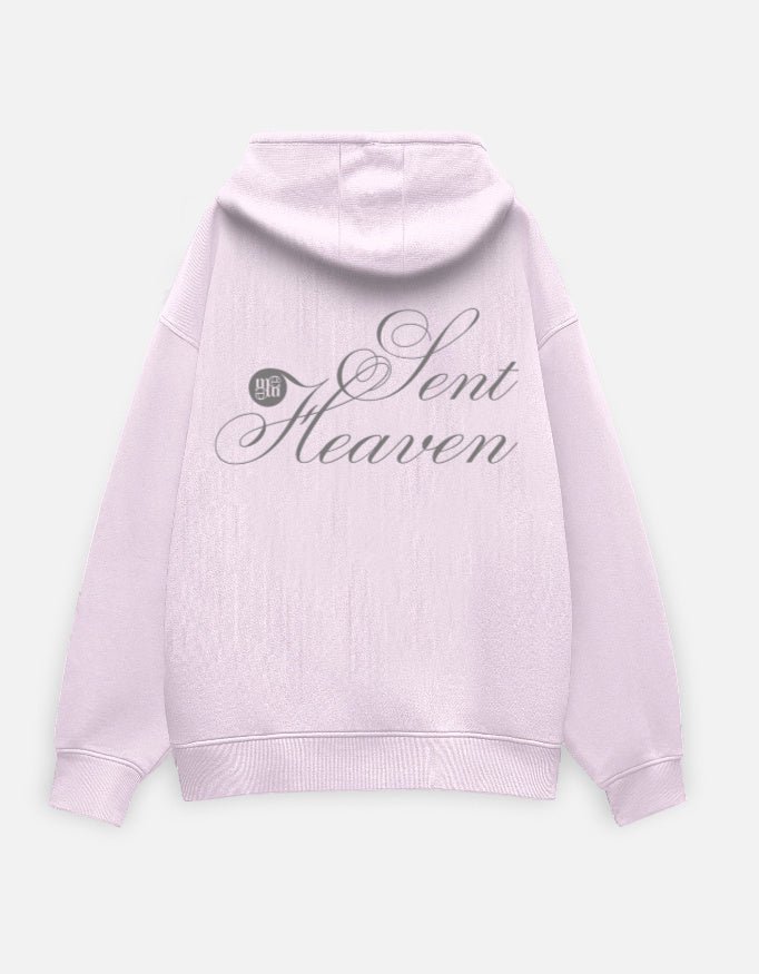 light pink moonearth hoodie with 'Heaven Sent' text on the back against a light gray background