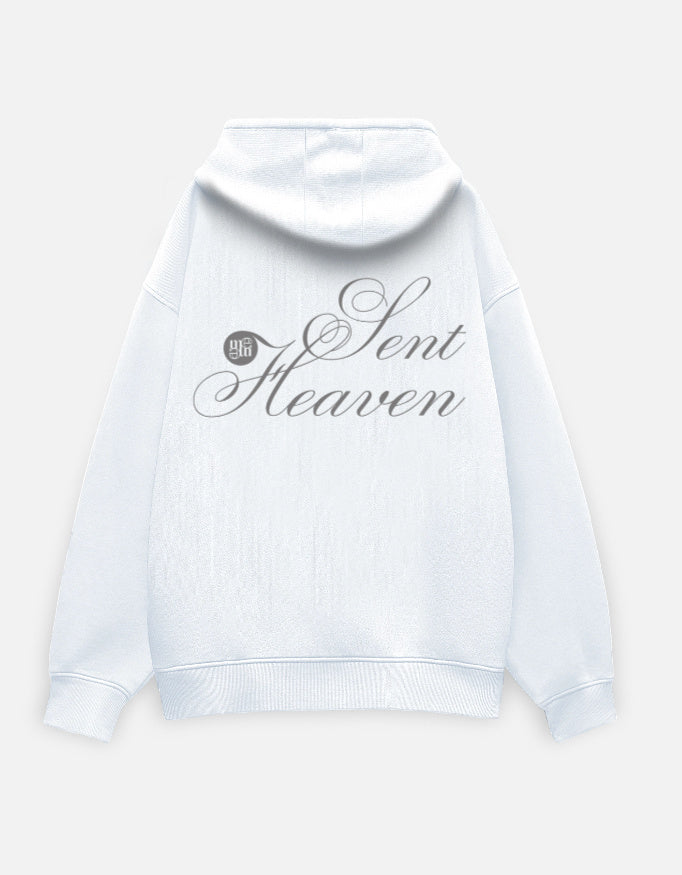White moonearth hoodie with 'Heaven Sent' text on a light gray background