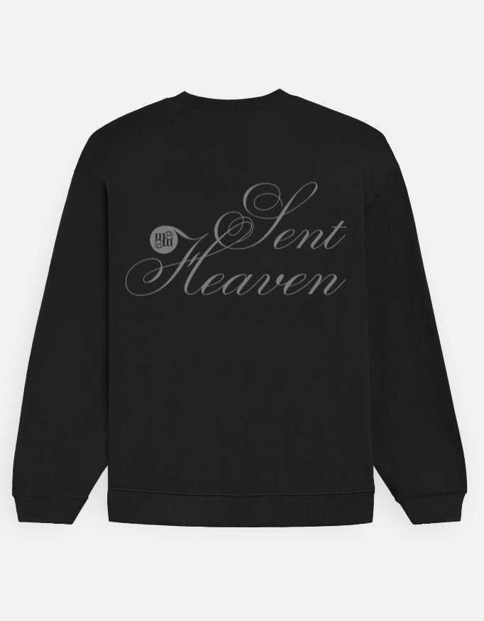Black moonearth sweatshirt with 'Heaven Sent' text on a light gray background
