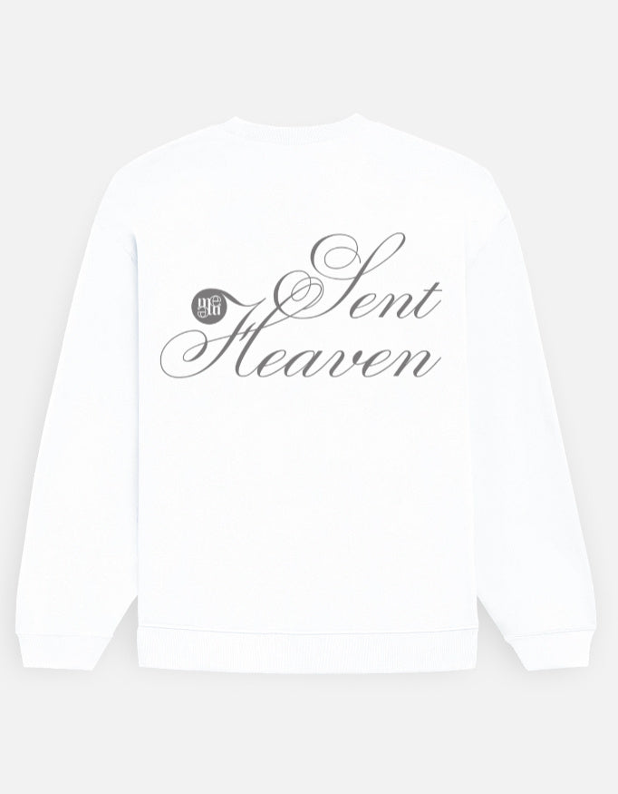 White moonearth sweatshirt with 'Heaven Sent' text on a light gray background