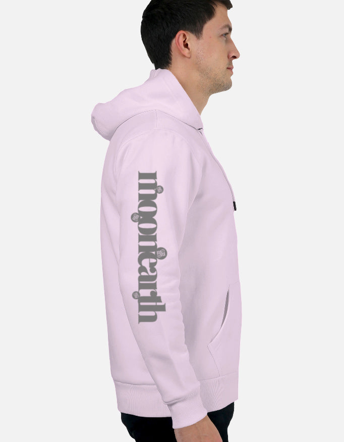 Person wearing a light pink moonearth hoodie with text on the back against a light gray background