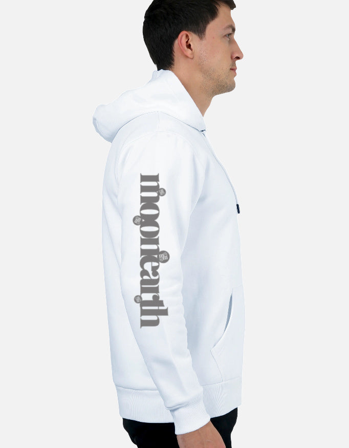 Person wearing a white hoodie with moonearth text on the sleeve against a light gray background