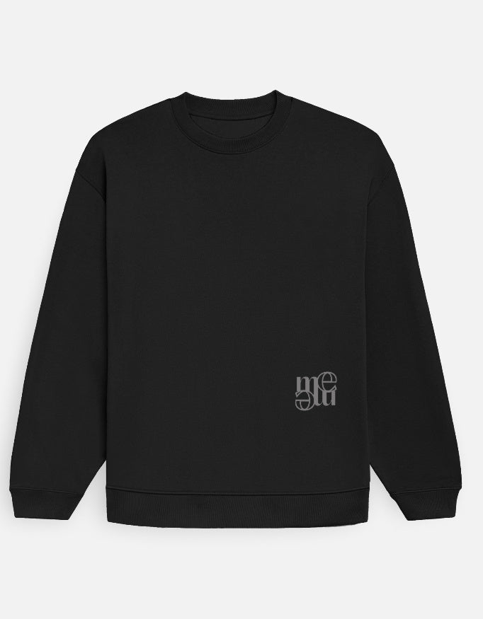 Black sweatshirt with a small moonearth logo on a light gray background