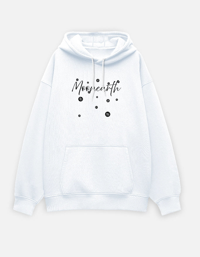 White hoodie with 'Moonearth' text and black polka dots on a light gray background