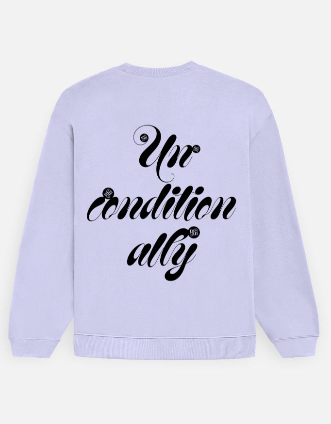 Light purple moonearth sweatshirt with black 'Unconditionally' text on a light gray background